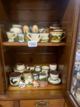 A quantity of Torquay ware including salts, match striker etc