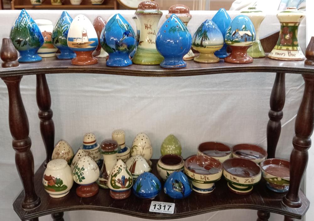 A good selection of Torquay pottery cruets