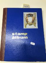 A stamp album including a selection ofmint Great Britain stamps etc
