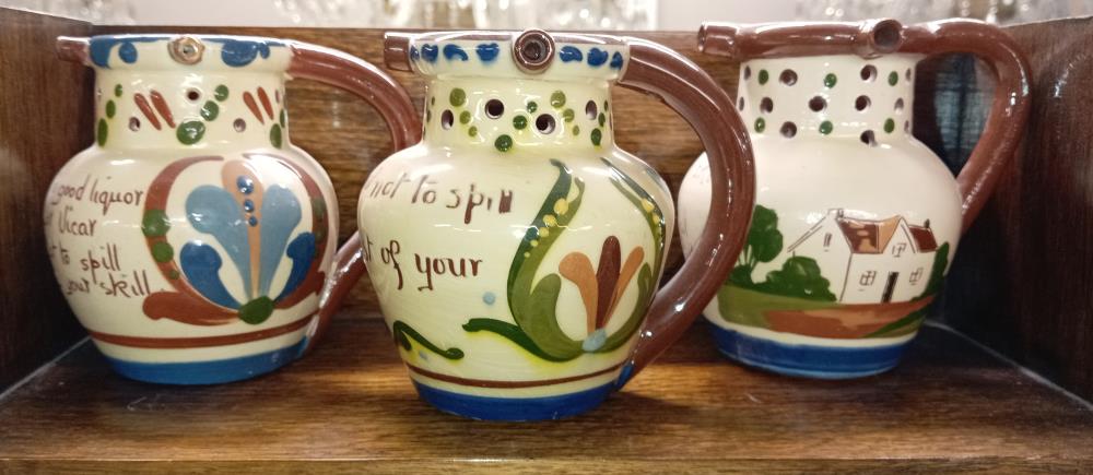 6 Torquay ware mid size puzzle jugs - Image 2 of 3