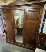 A large sectional wardrobe with mirror centre section 188 x 57 x Height 183cm
