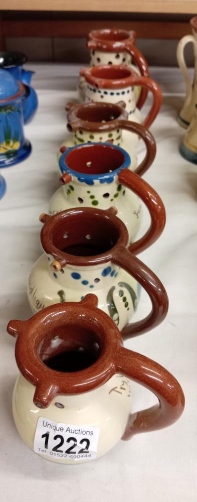 6 Torquay ware puzzle jugs