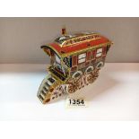 A Royal Crown Derby caravan with gold stopper