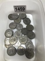 A collection of 33 one shilling coins