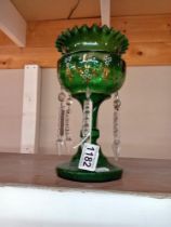 A Victorian green glass lustre, Height 25cm, lustre undamaged, droppers A/F