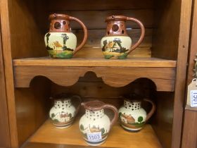 5 Torquay ware puzzle jugs