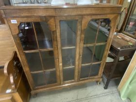 A glass fronted 2 door bookcase