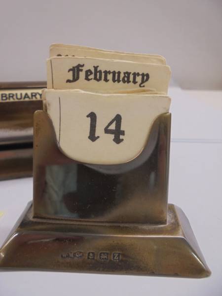 A silver perpetual desk calendar and a brass example. - Image 2 of 3