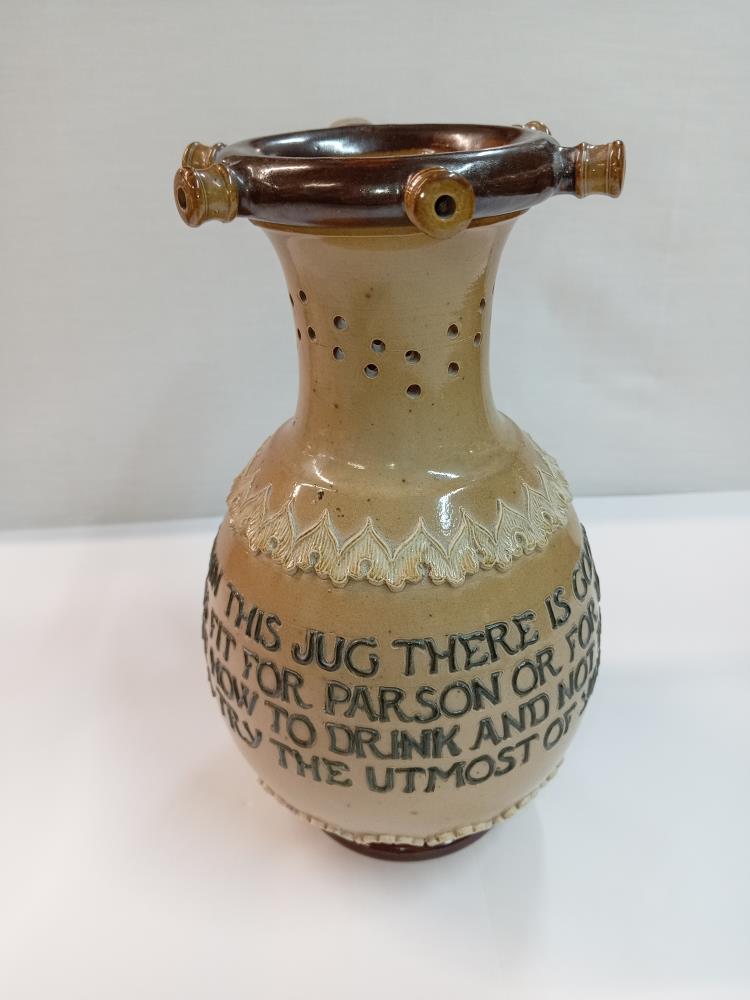 A Doulton Lambeth stoneware puzzle jug. Height 23cm - Image 2 of 5