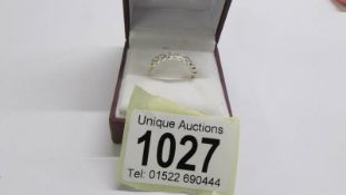 An 18ct ten stone bar diamond ring, size M, 1.65 grams.