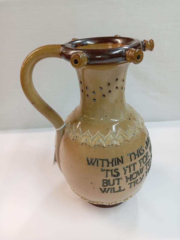 A Doulton Lambeth stoneware puzzle jug. Height 23cm - Image 3 of 5