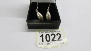 A pair of 9ct white gold drop earrings, 1.76 grams.