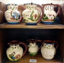 6 Torquay ware mid size puzzle jugs
