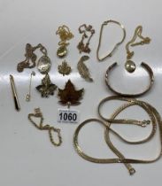 A collection of Gold coloured metal jewellery including chains & necklaces