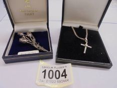 A silver National Trust flower brooch and a silver cross on silver chain