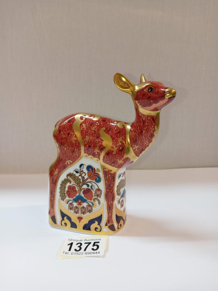 A Royal Crown Derby Fawn with gold stopper