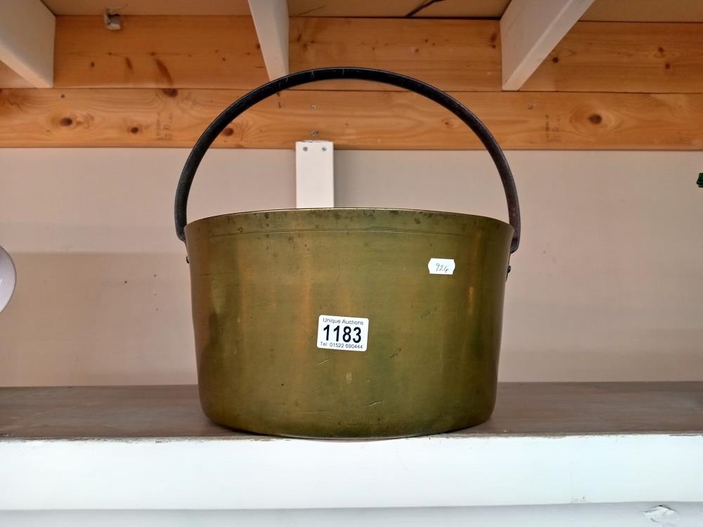 A Victorian brass jam pan