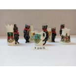 5 pieces of crested ware with lucky black cats