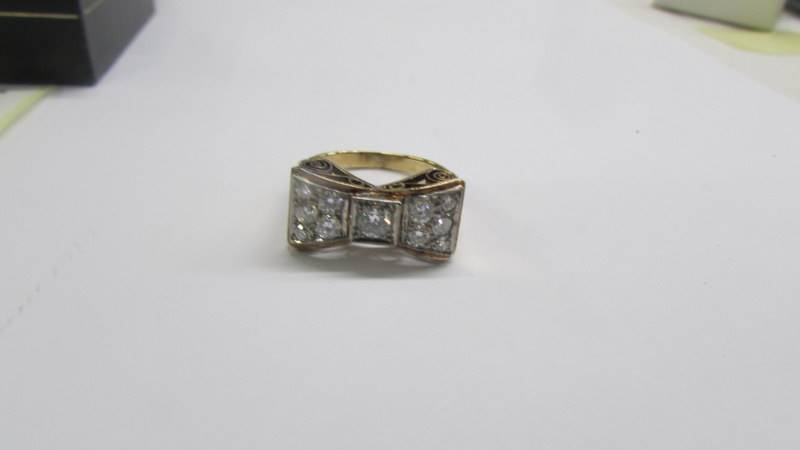 A yellow gold bow shaped ring (tests as 9ct), size P, 4.74 grams. - Image 3 of 3
