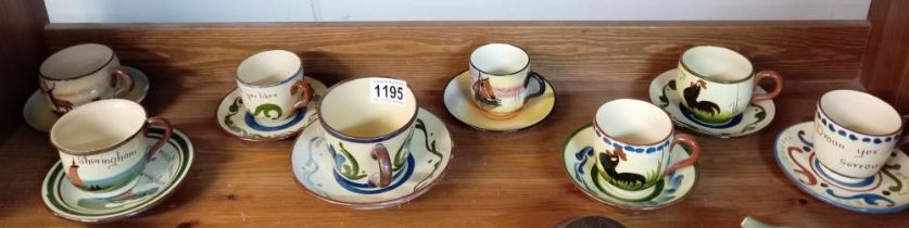 8 Torquay pottery cups & saucers