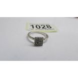 An art deco 18ct gold square pattern diamond ring, size N, 2.37 grams.