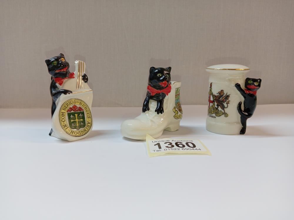 3 pieces of crested ware with attached black cats