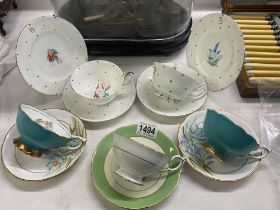 2 Wedgewood trios and 3 cup and saucer sets being Coalport and Royal Stafford