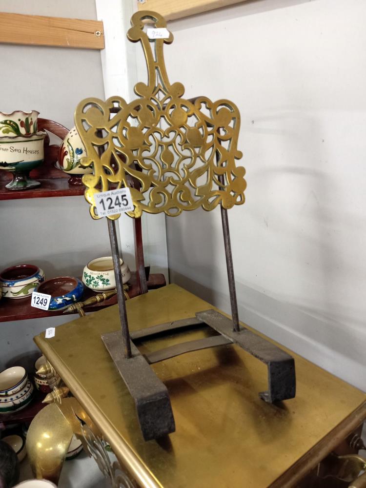 A Victorian brass & iron adjustable trivet