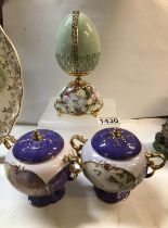 Two porcelain music boxes plus a garden glory musical egg by Ardleigh Elliot (tunes played- "Music