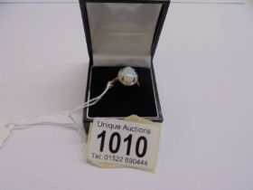 A 9ct gold ring set opal, size P, 2.56 grams.
