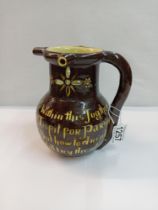 C H Brannam barum pottery puzzle jug. Height 17.5cm