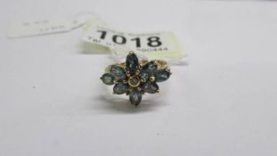 A white/yellow gold emerald and diamond cluster ring, size M half, 2.8 grams.