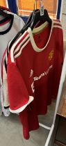 3 official Adidas Manchester United football shirts including team viewer and Chevrolet sponsors