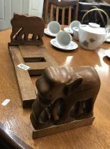 Heavy carved teak sliding elephant book ends