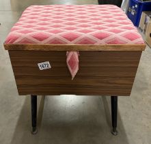 A vintage sewing box/stool and contents