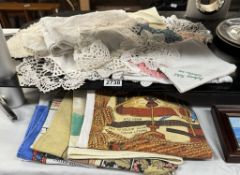 A quantity of doylies, table cloths & tea towels etc.