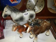 Four ceramic horses.