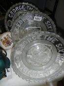 Three George VI commemorative glass plates.