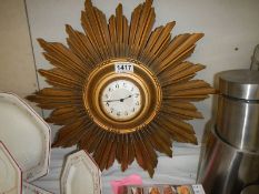 A 'Sunburst' wall clock.