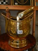 A brass coal scuttle with shovel. COLLECT ONLY.