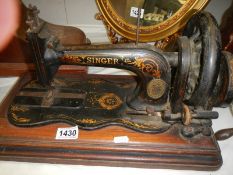 A vintage Singer sewing machine (no cover) COLLECT ONLY.