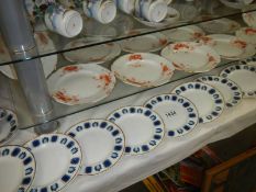 A mixed lot of tea plates etc.,