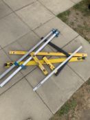 A quantity of metal spirit levels & clamps