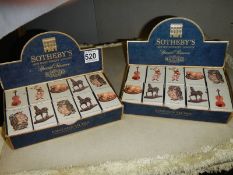 Two complete boxes of Sotheby's match boxes.