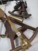 Two wood and brass sextants.