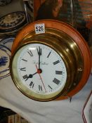 A 20th century battery operated ships clock in working order.