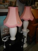 A pair of table lamps.