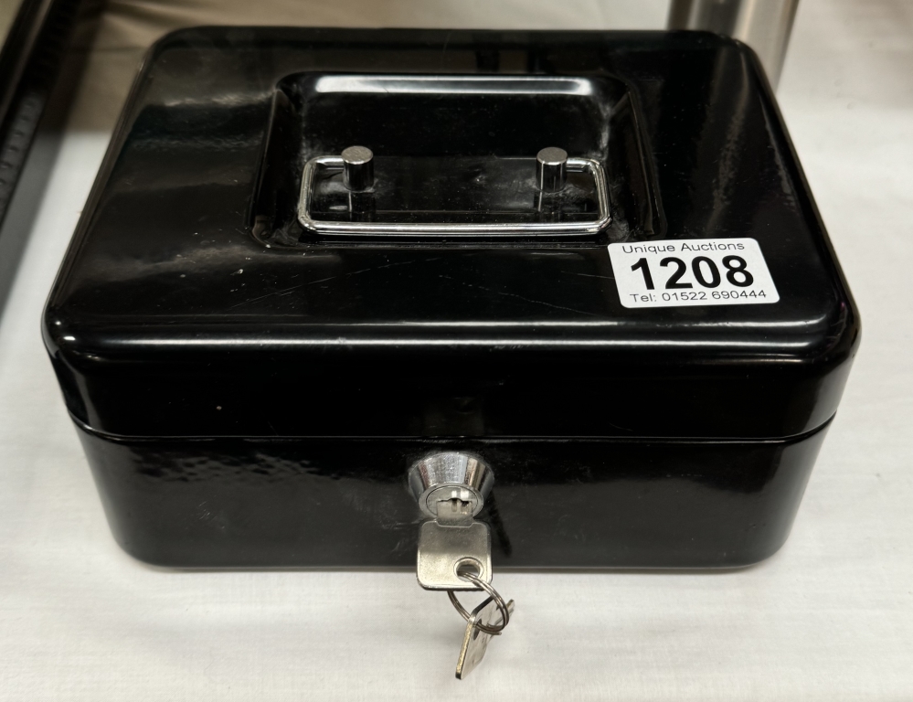 A cash tin with keys