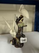 A vintage ceramic Heron bird group on a tree, height 24cm