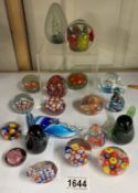 A quantity of paperweights